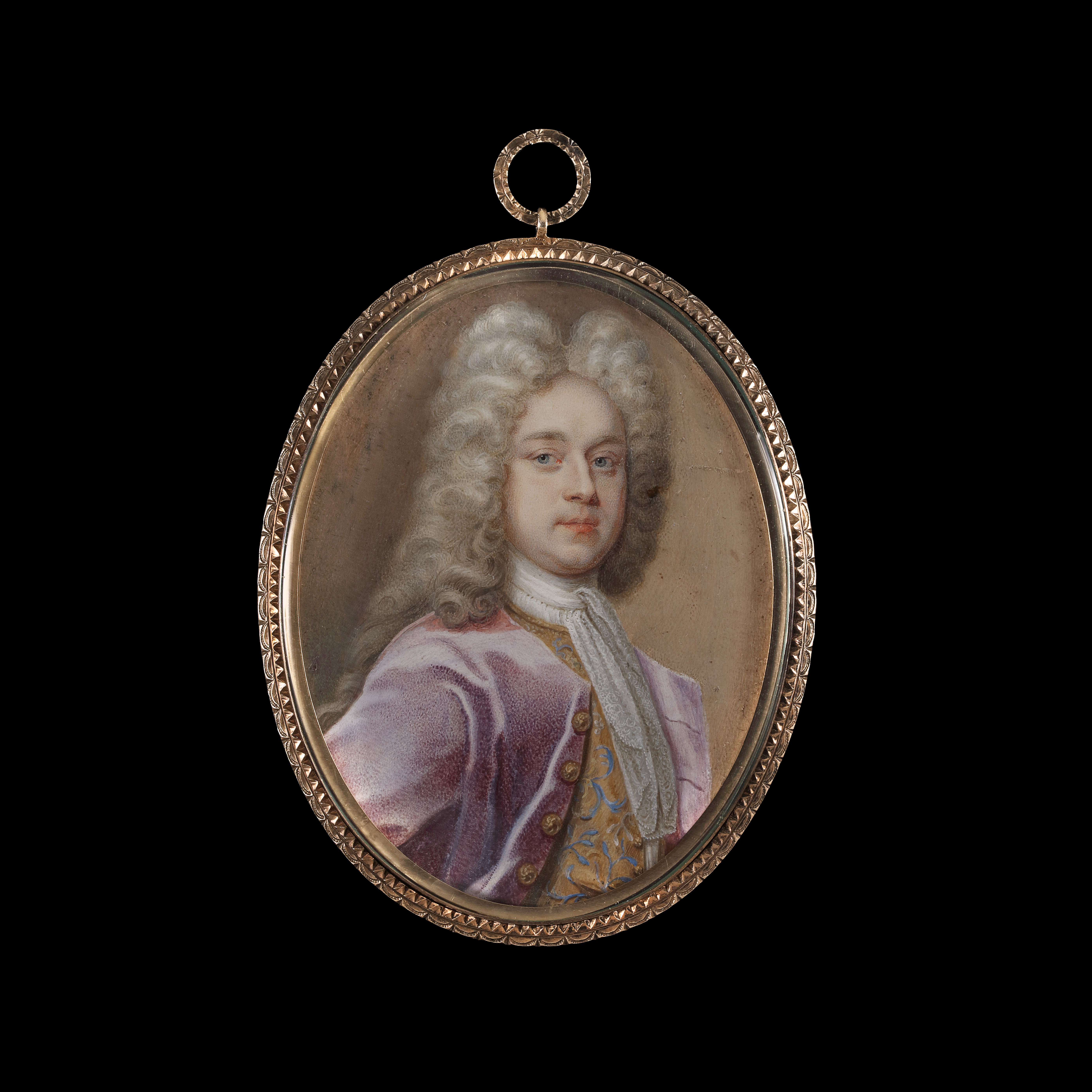 Portrait miniature of a Gentleman, wearing lilac-coloured coat, gold waistcoat with blue embroidery and white lace jabot
