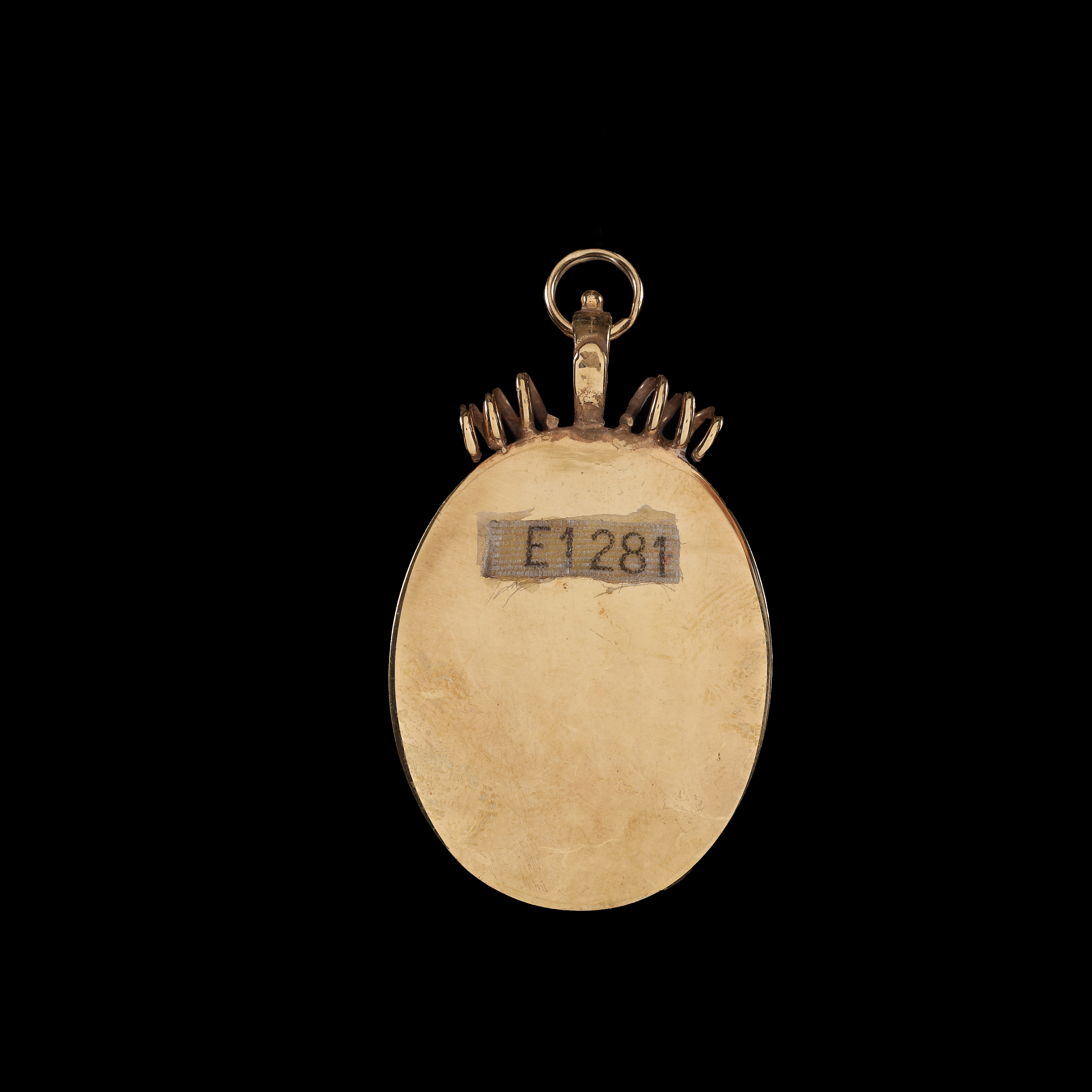 A portrait miniature of a lady of the French court, wearing a blue dress with gold braid and lace border, a large pearl and diamond jewel on her shoulder, with light-coloured hair