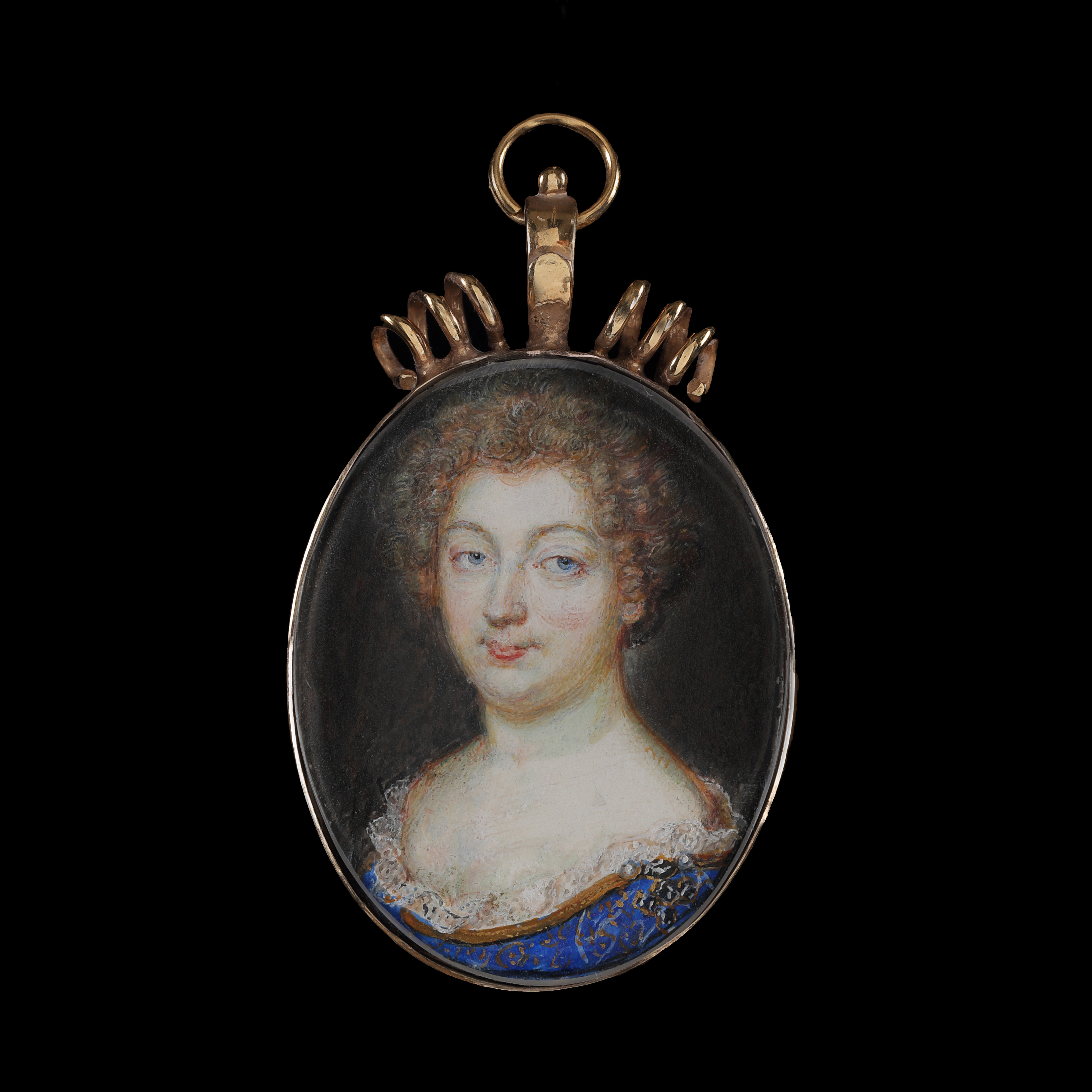 A portrait miniature of a lady of the French court, wearing a blue dress with gold braid and lace border, a large pearl and diamond jewel on her shoulder, with light-coloured hair