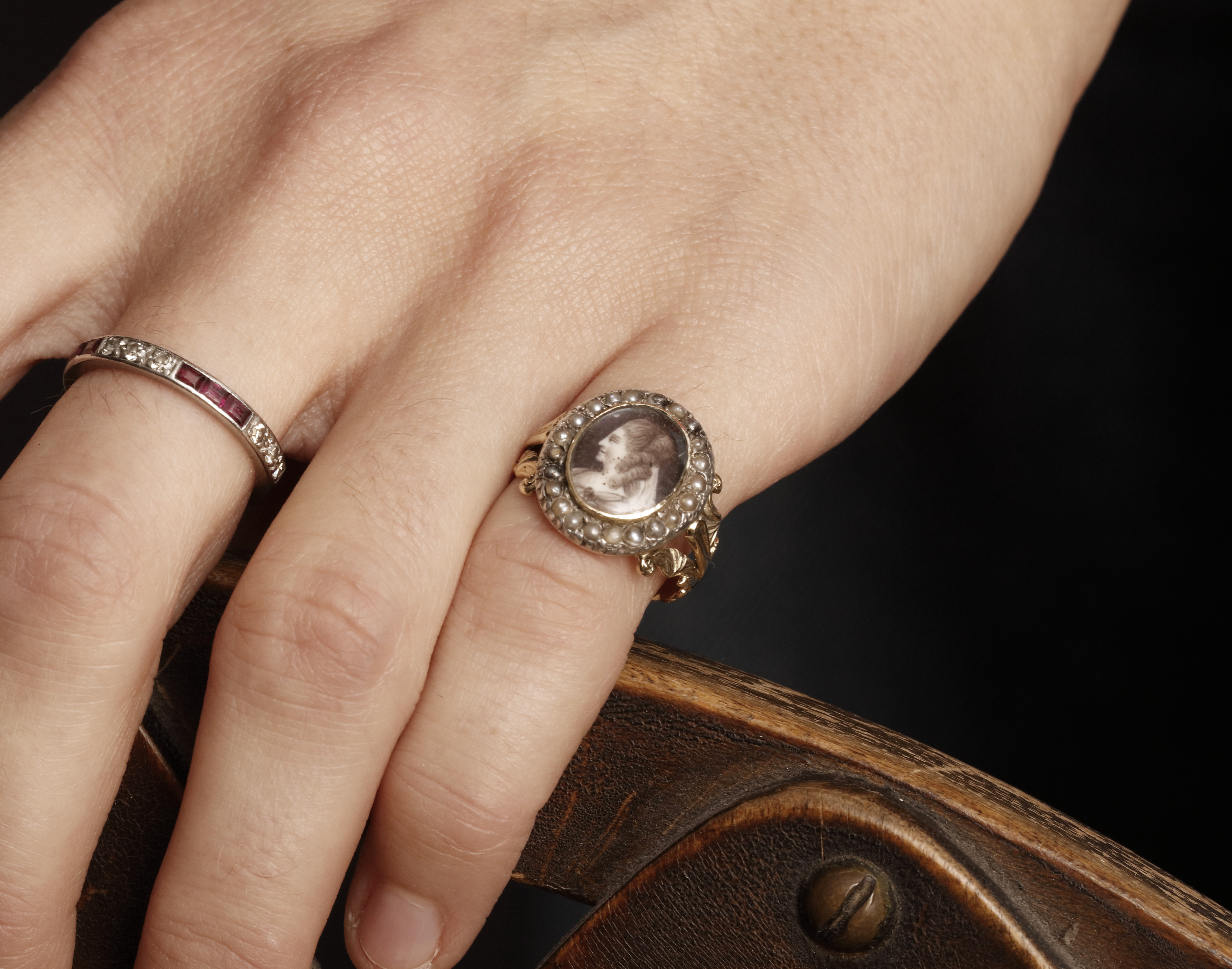 Portrait miniature of Queen Marie Antoinette, profile to the left, wearing classical style dress, her hair powdered and styled with a veil; circa 1795