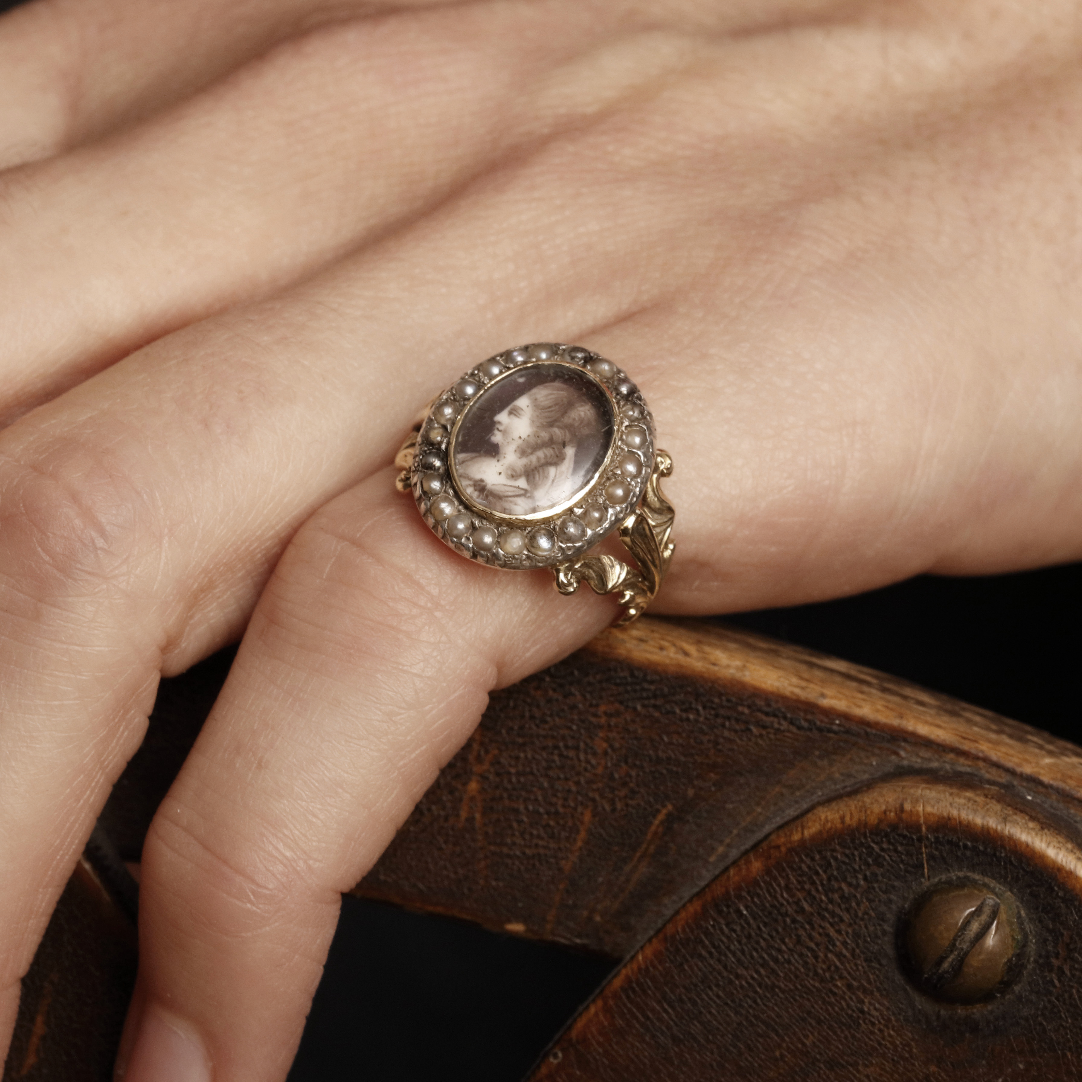 Portrait miniature of Queen Marie Antoinette, profile to the left, wearing classical style dress, her hair powdered and styled with a veil; circa 1795