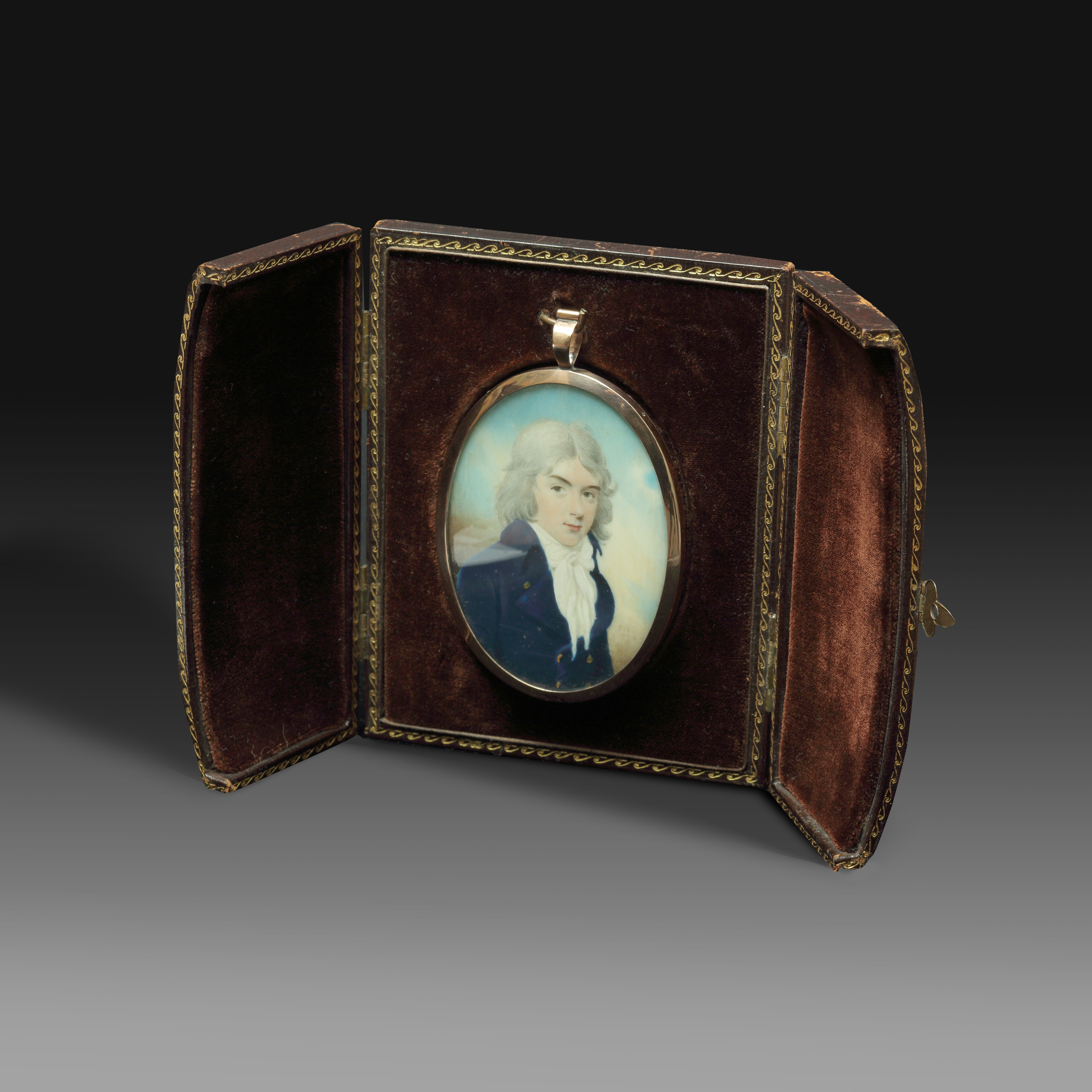 Portrait miniature of a son of Robert Graham of Fintry, almost certainly Robert (1775-1799), wearing blue coat with white waistcoat and stock, his hair worn long and powdered