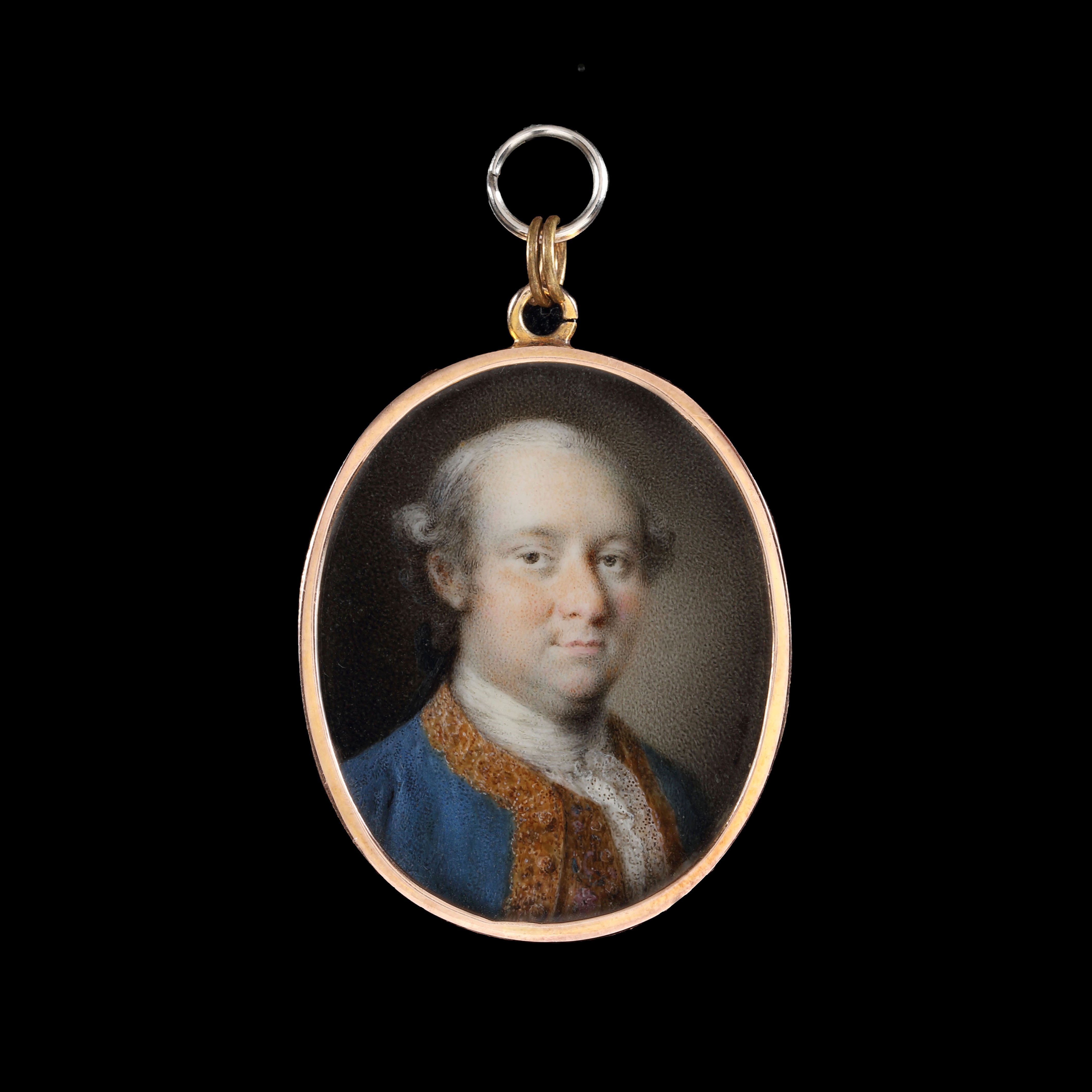 Portrait miniature of a Gentleman, wearing gold-braided blue jacket and matching waistcoat, white lace shirt, his hair powdered
