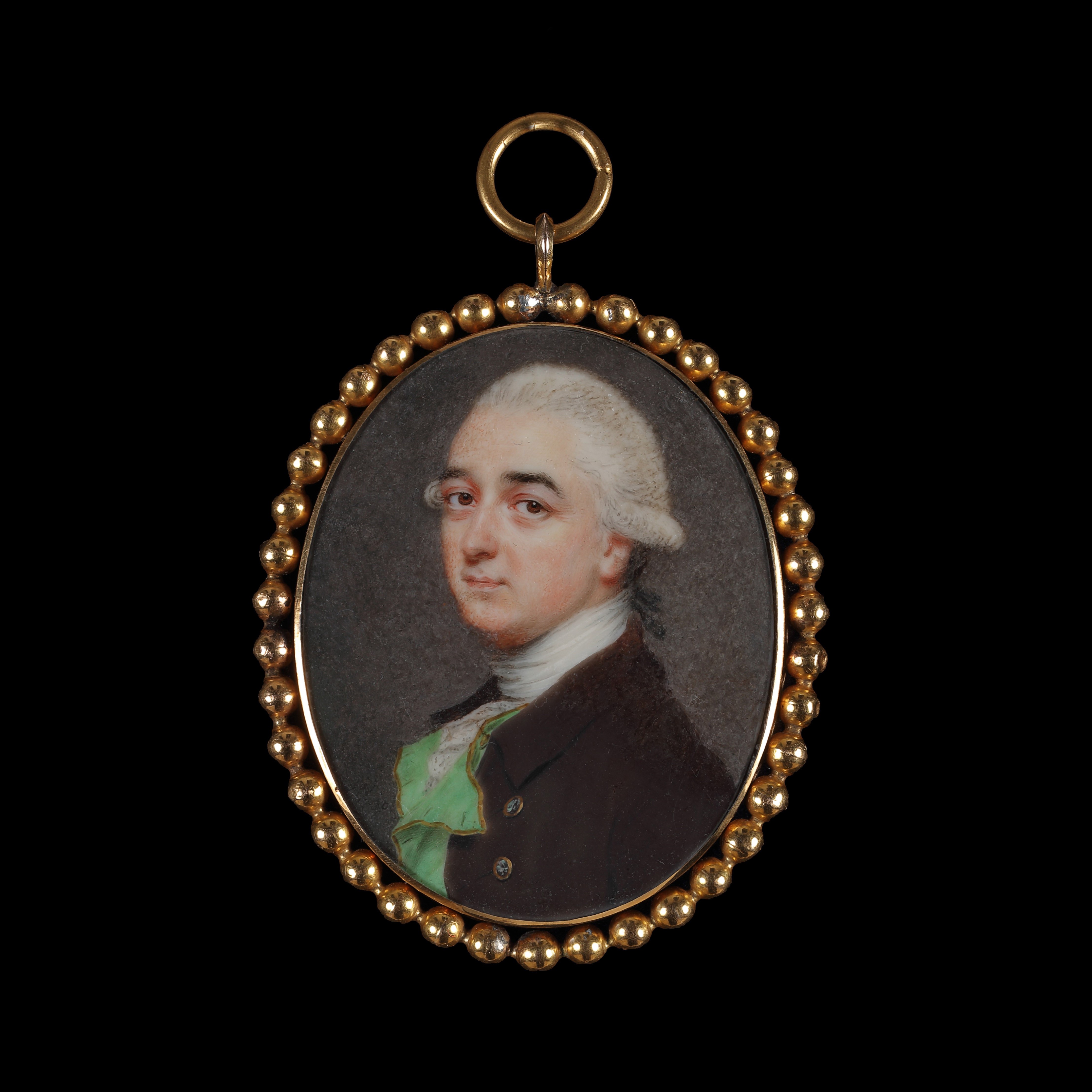 Portrait miniature of a Gentleman, wearing dark brown coat and acid-green waistcoat trimmed with gold braid