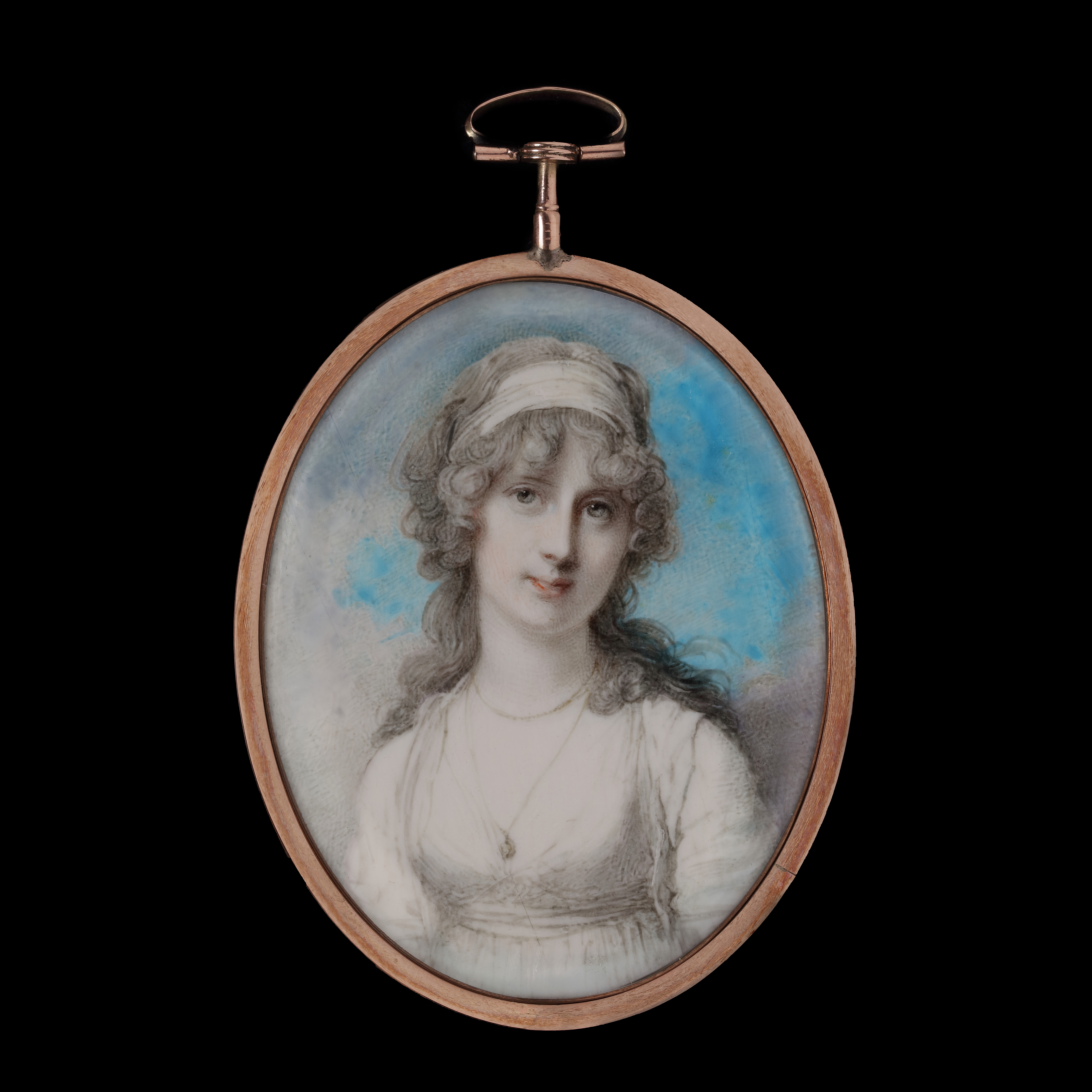 Portrait miniature of A Lady, wearing white dress, white bandeau and pendant (possibly a wedding ring)