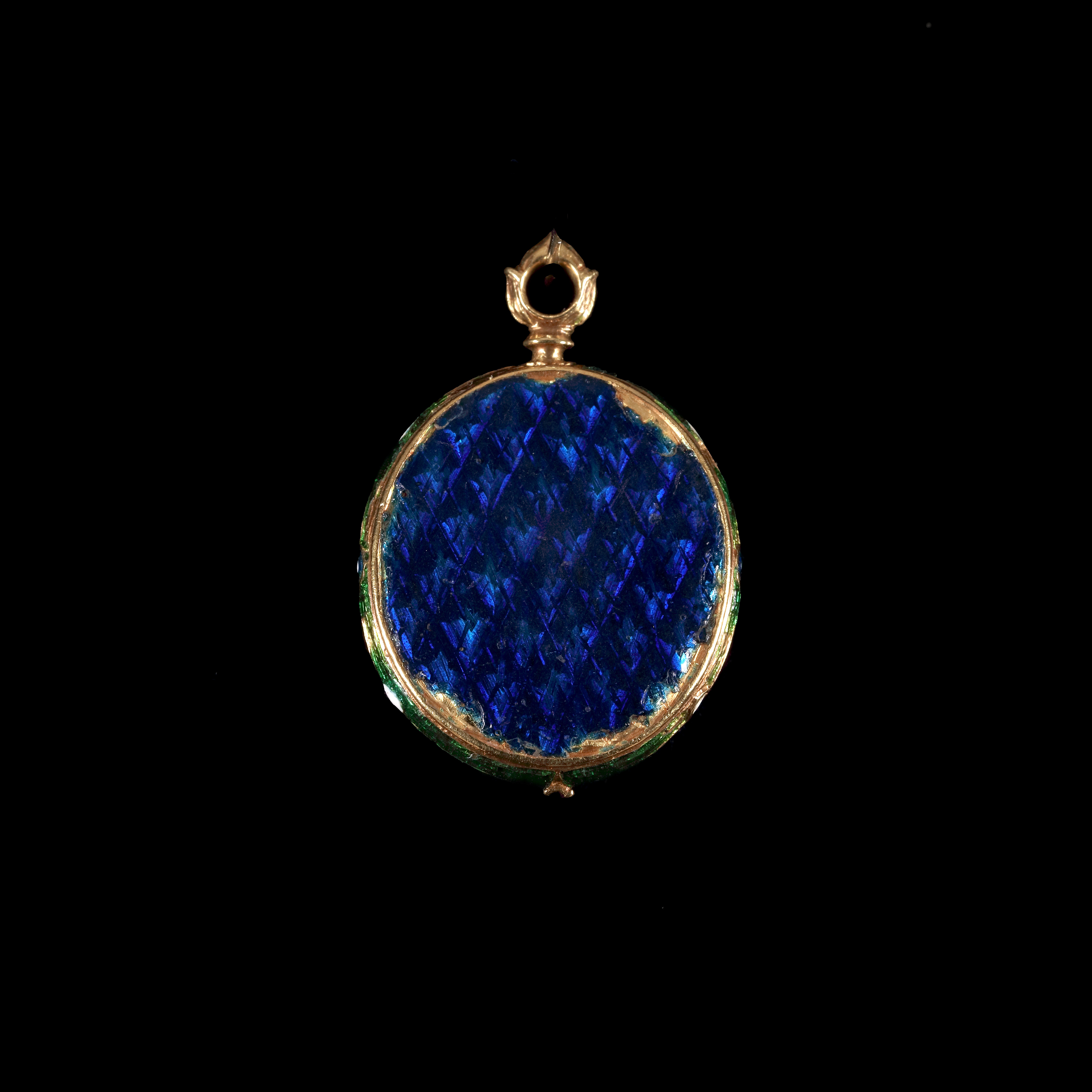 Portrait miniature of a Gentleman, wearing black doublet and white collar trimmed with lace, blue background and gold border