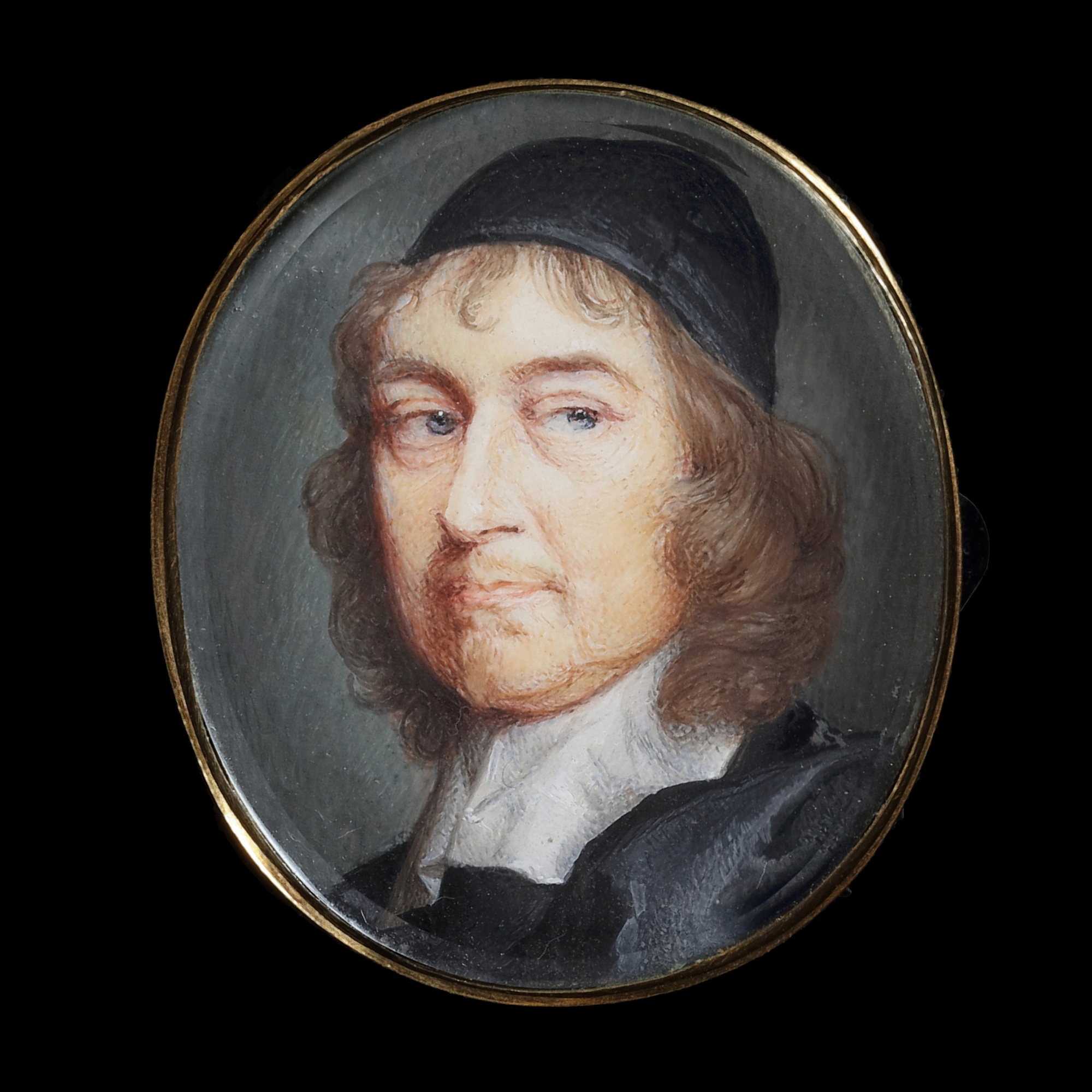 Portrait miniature of a Gentleman wearing a black cap, black doublet, white lawn collar