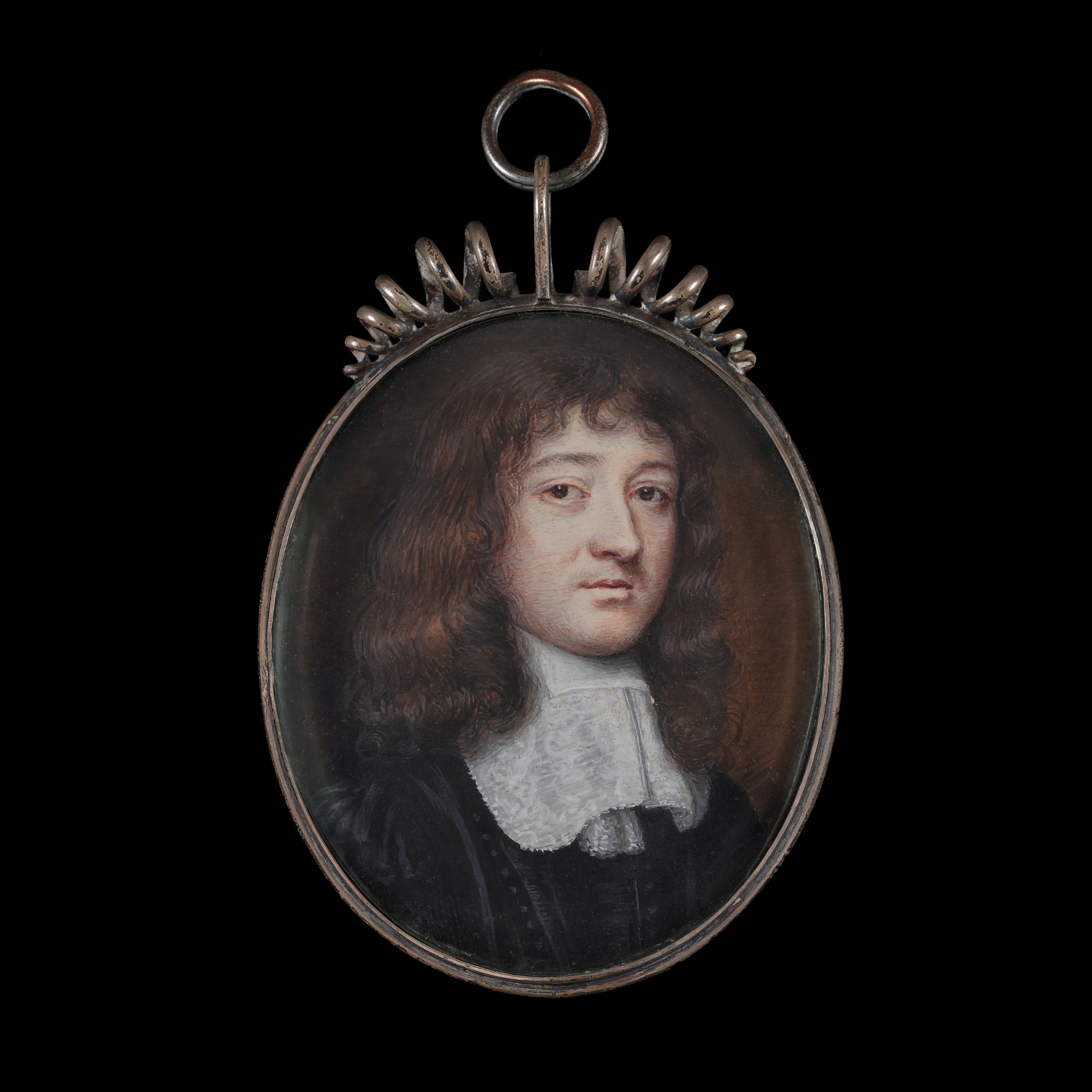 Portrait miniature of a Gentleman, wearing a black doublet with fine lace bands (collar), the band tassels visible below, his hair worn long