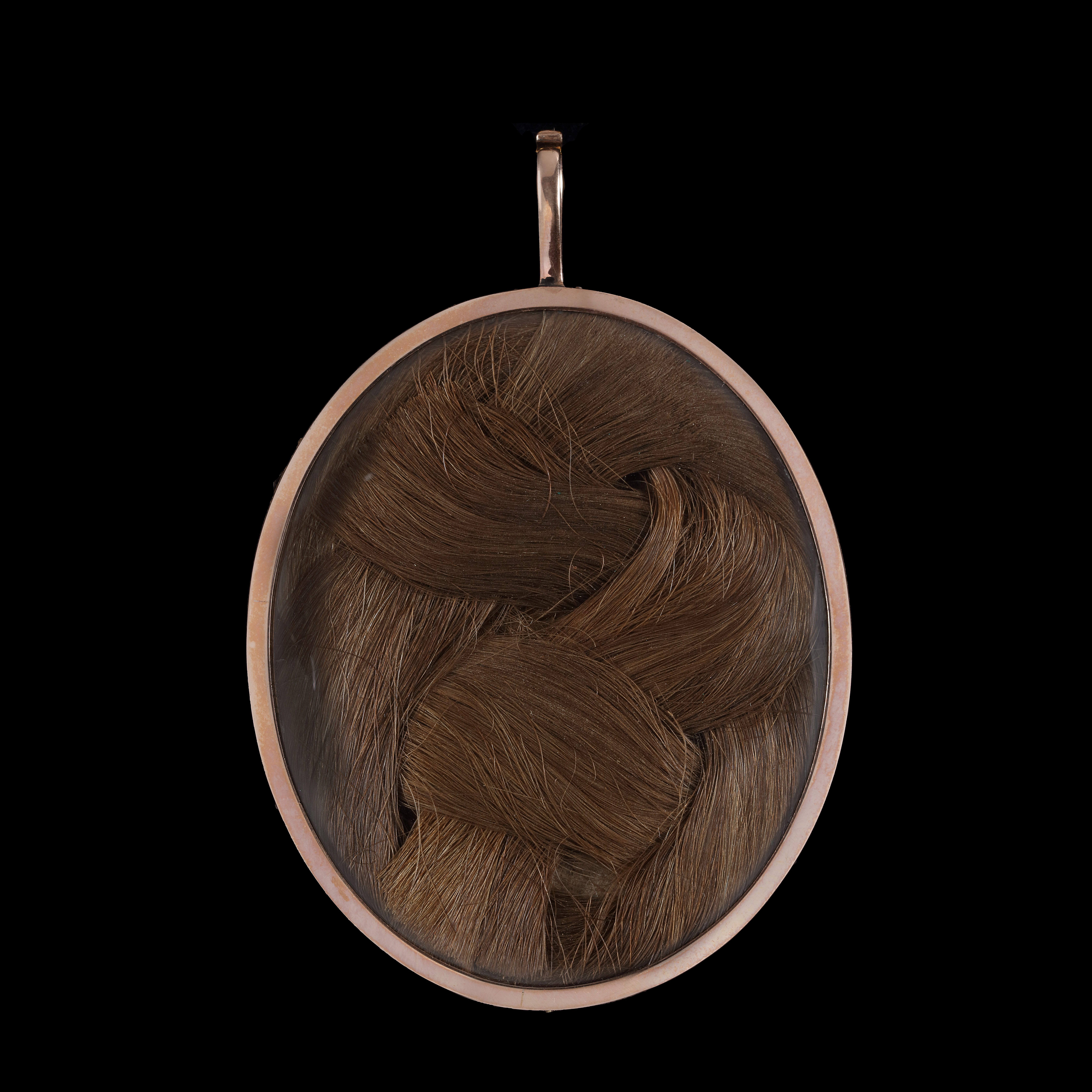 Portrait miniature of a young Lady wearing a white dress with a tied fichu, a straw hat with a frilled white cap beneath and tied a ribbon below her chin, her curled and powdered hair worn loose