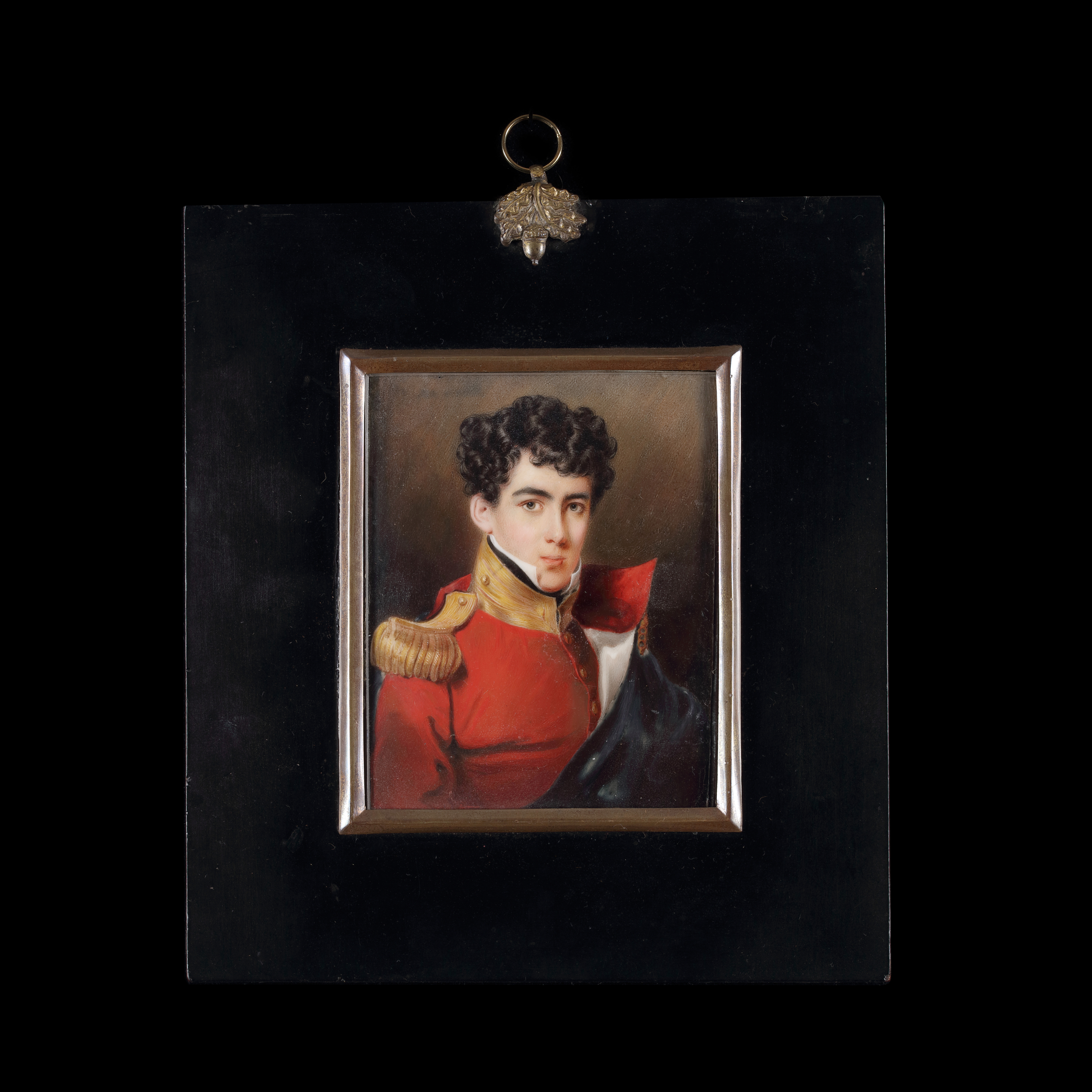 Portrait of a subaltern of the Line Infantry, wearing a red coatee with a single epaulette, gold lace and yellow facings, a dark cloak over his left shoulder