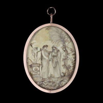 A double-sided hairwork miniature, the front decorated with a couple in a garden, with ‘Je me tache ou je meurs’ inscribed on a pedestal, also decorated with two flaming hearts, the pedestal surmounted by a cupid, the other with a woman fleeing through a garden, with ‘Amicizia’ inscribed on a pedestal