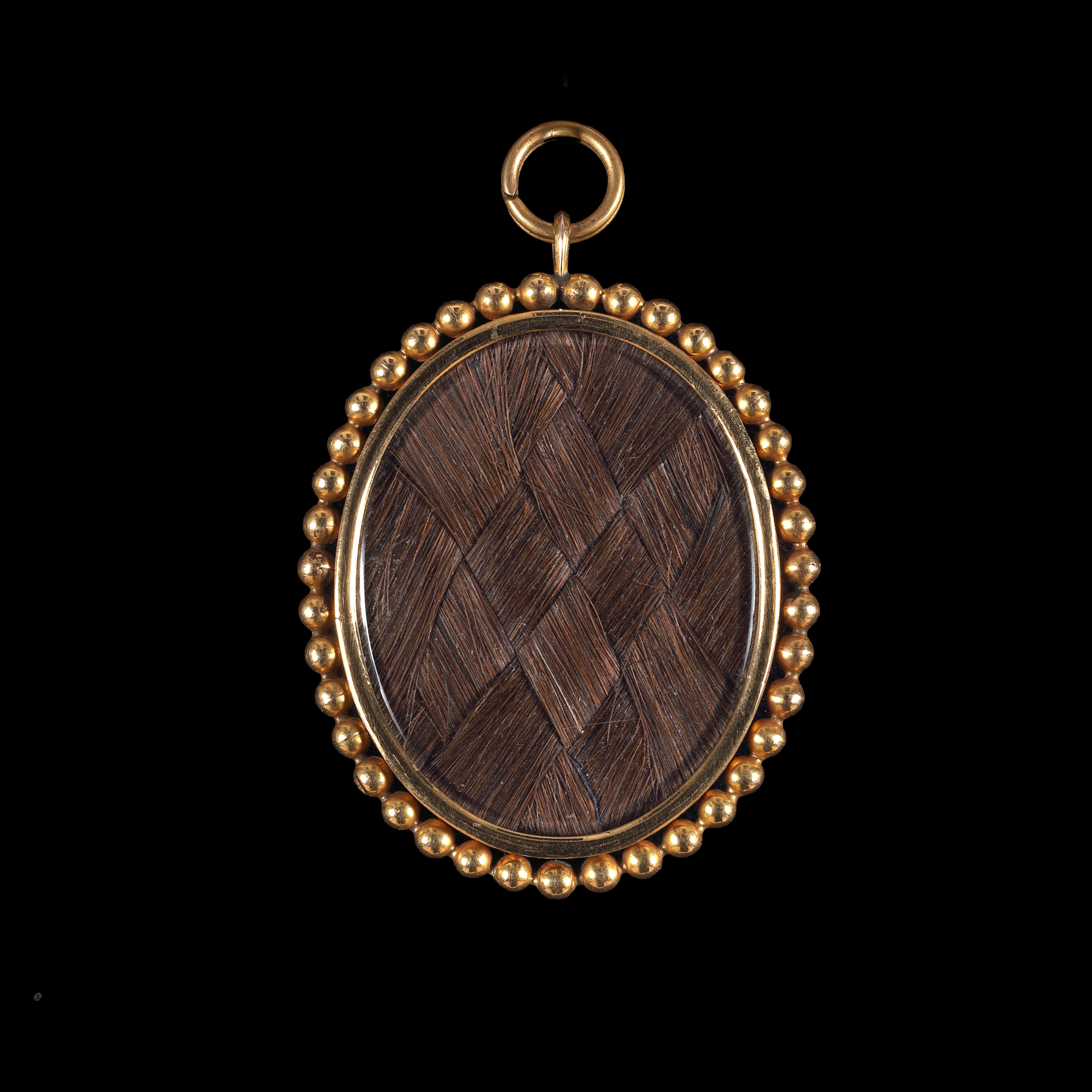 Portrait miniature of a Gentleman, wearing dark brown coat and acid-green waistcoat trimmed with gold braid