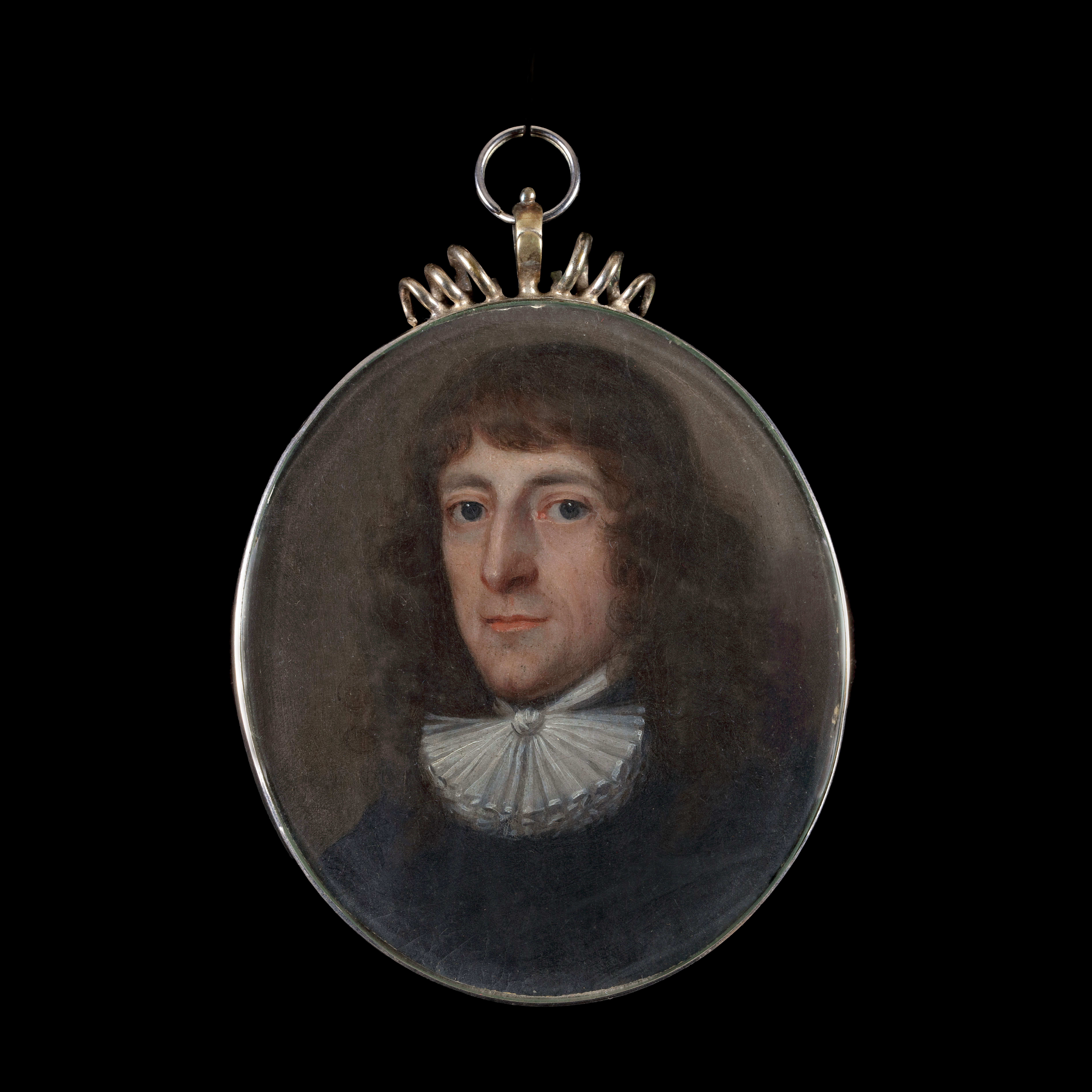 A pair of portraits of  Lady and Gentleman, possibly mother and son, she in a low cut blue dress with pearls, he with a white lace collar and black coat,