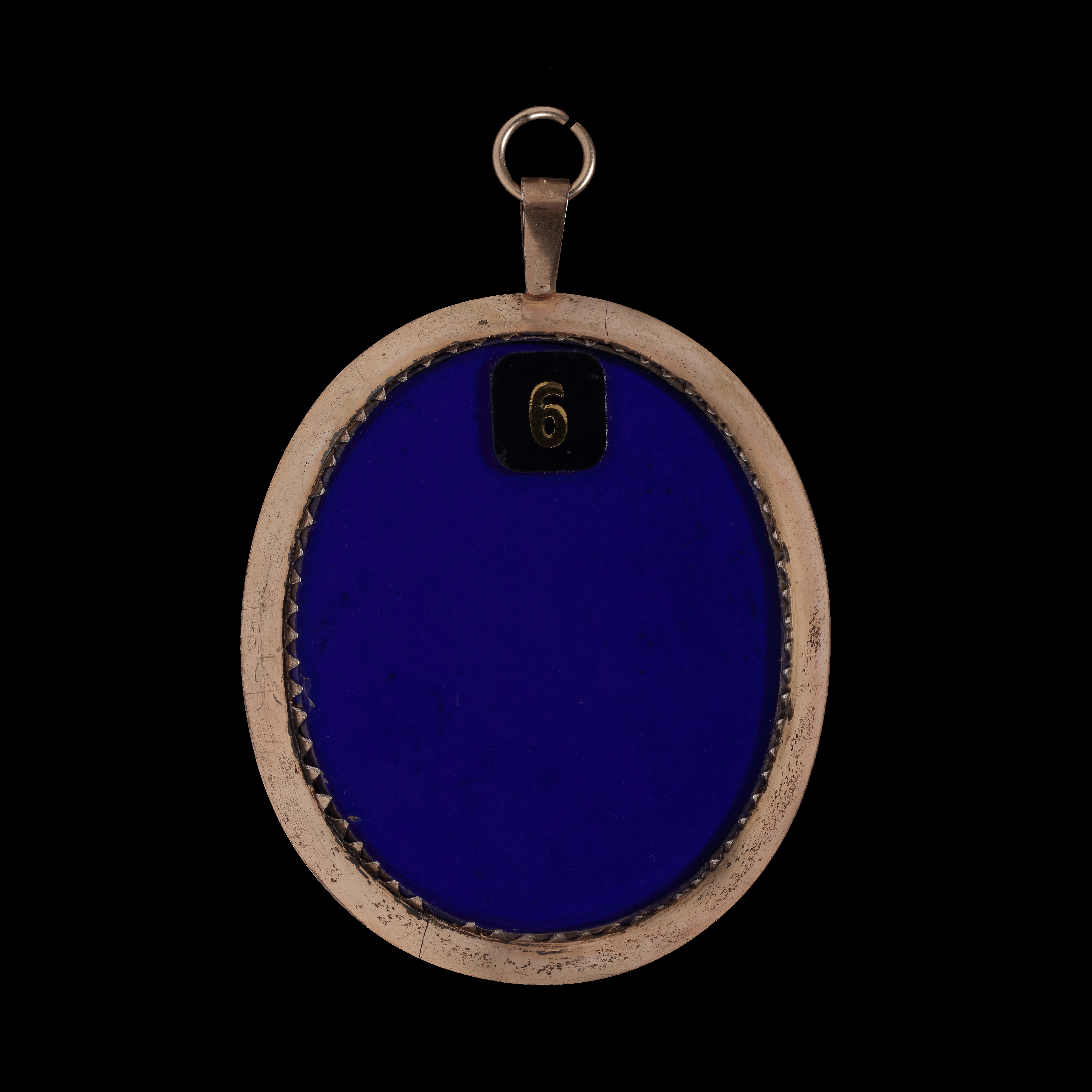 Portrait miniature of a Lady, possibly Mrs Bardsley, wearing a white dress, with white and blue striped sleeves, her hair worn up and powdered, with a gold necklace