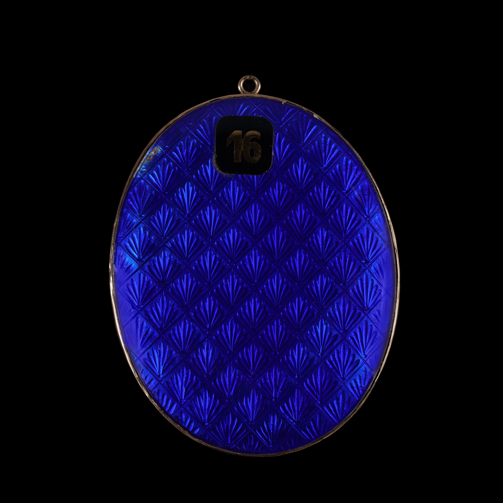 A portrait miniature of a Gentleman, wearing dark blue coat with black collar, white waistcoat and stock