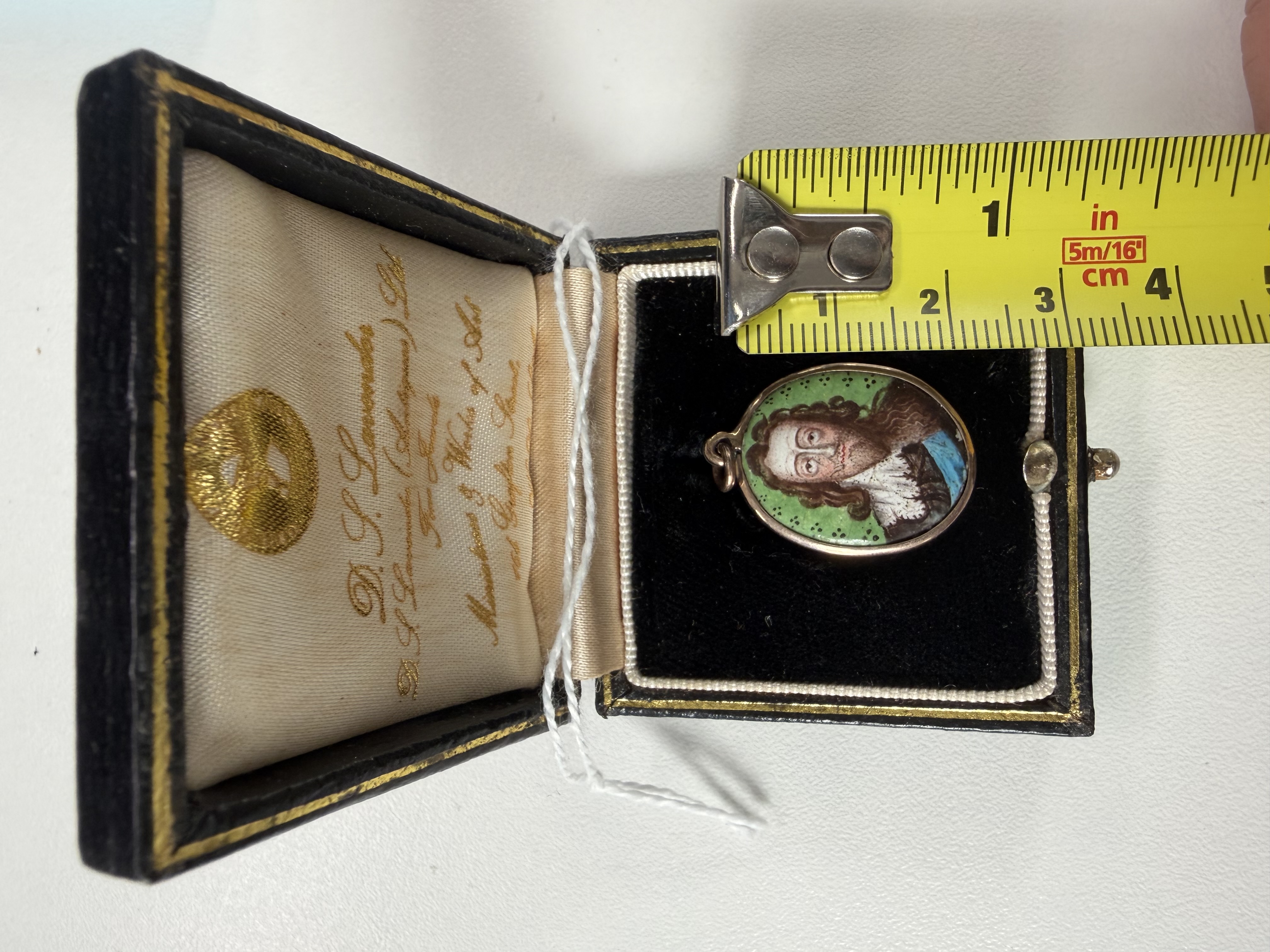 Portrait enamel of of King Charles I (1600-1649), the double-sided enamelled copper plaque, depicting a portrait of King Charles I to one side, counter-enamel with royal cipher 'CR' surmounted with a crown and enclosed by martyr's palms