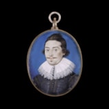 Portrait miniature of a Gentleman, said to be a member of the ‘Dorset’ family, wearing white falling ruff trimmed with lace and black, embroidered doublet