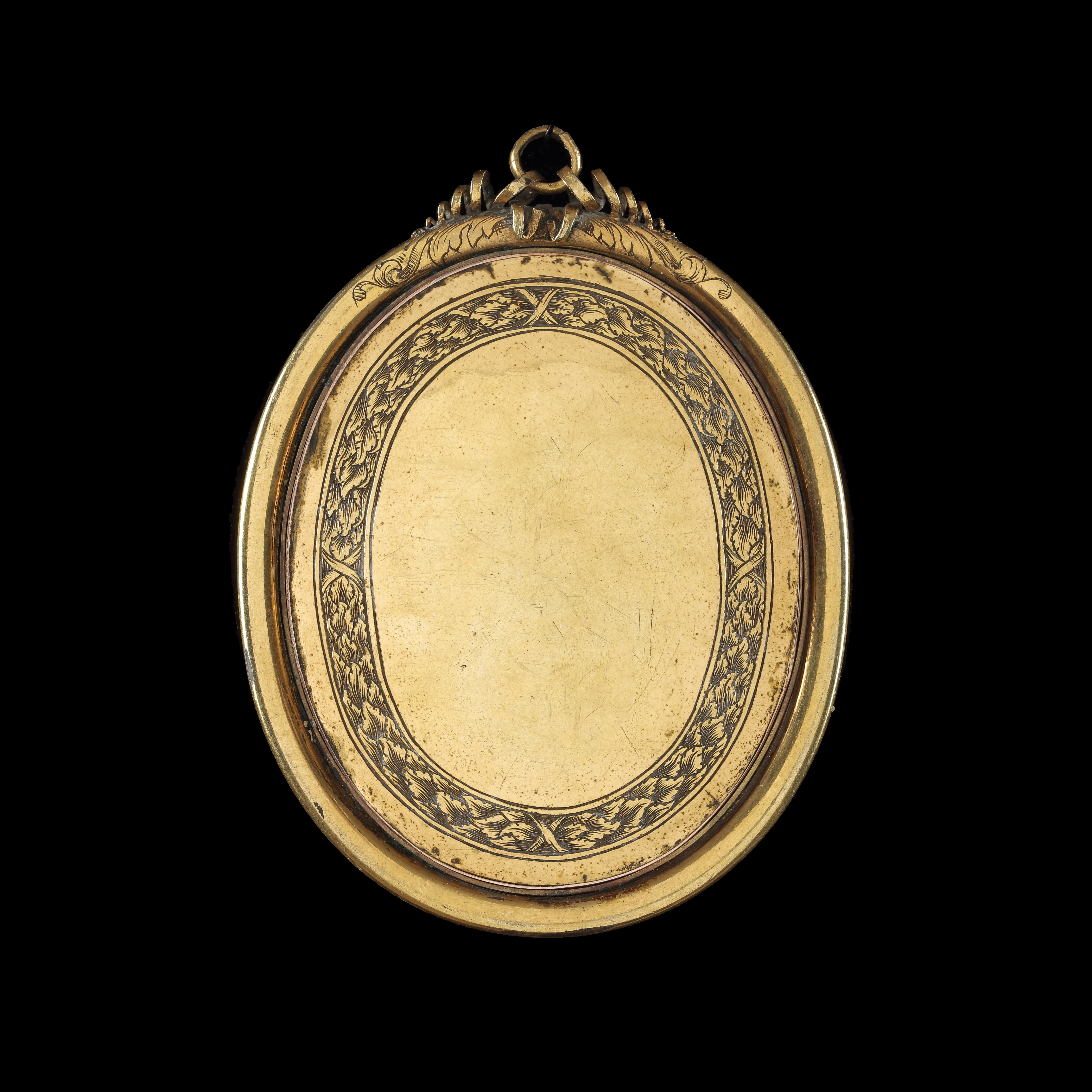 Portrait miniature of a Young Gentleman, wearing pale blue doublet over a white shirt and blue cape fastened with a jewelled pin at his shoulder and white lace jabot