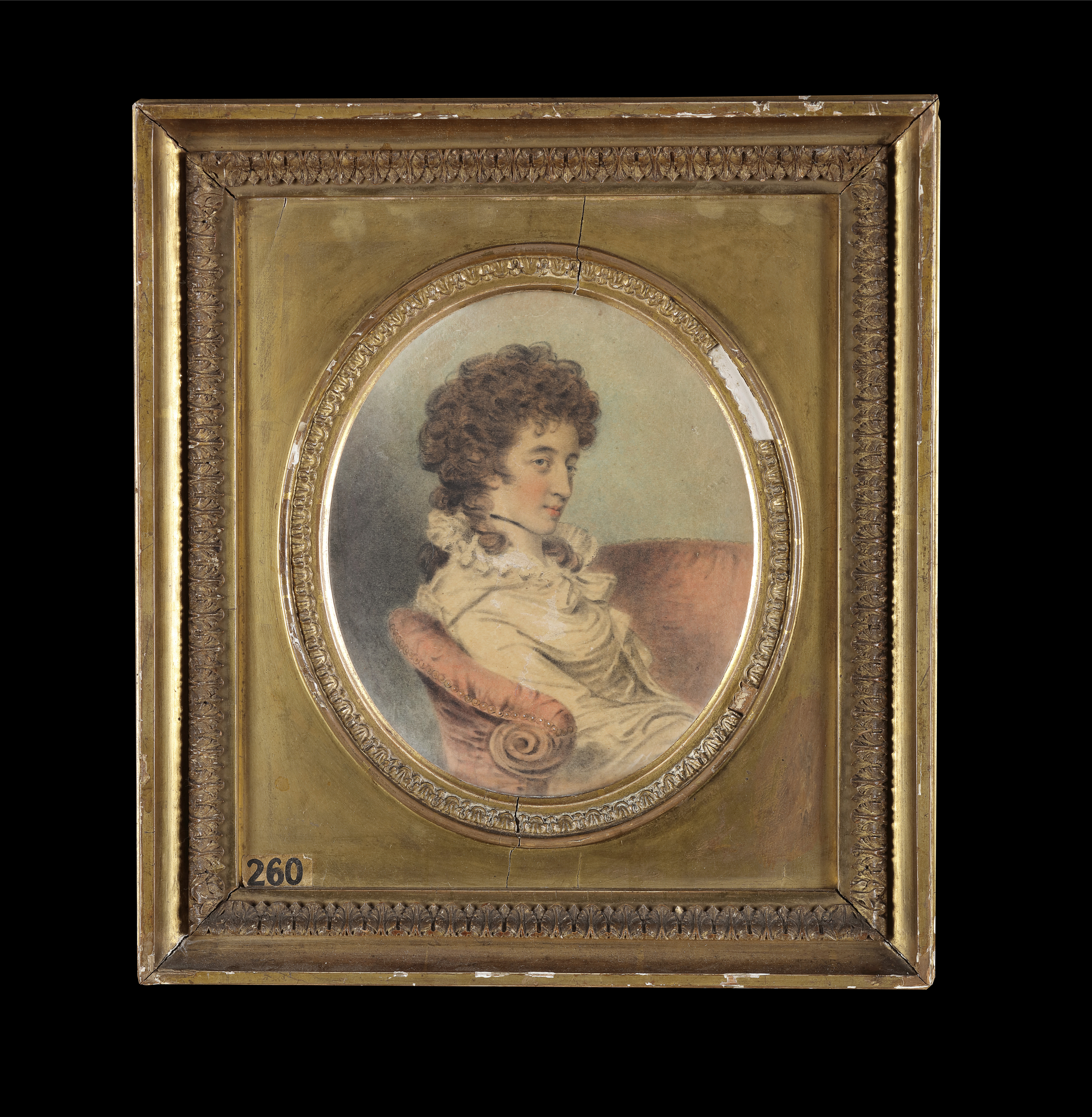 Portrait of Mrs. Elizabeth Legge (née Musgrave; 1749-1820) seated on a red sofa facing left in three-quart profile, wearing a white cloak with a pleated standing collar, a black choker necklace