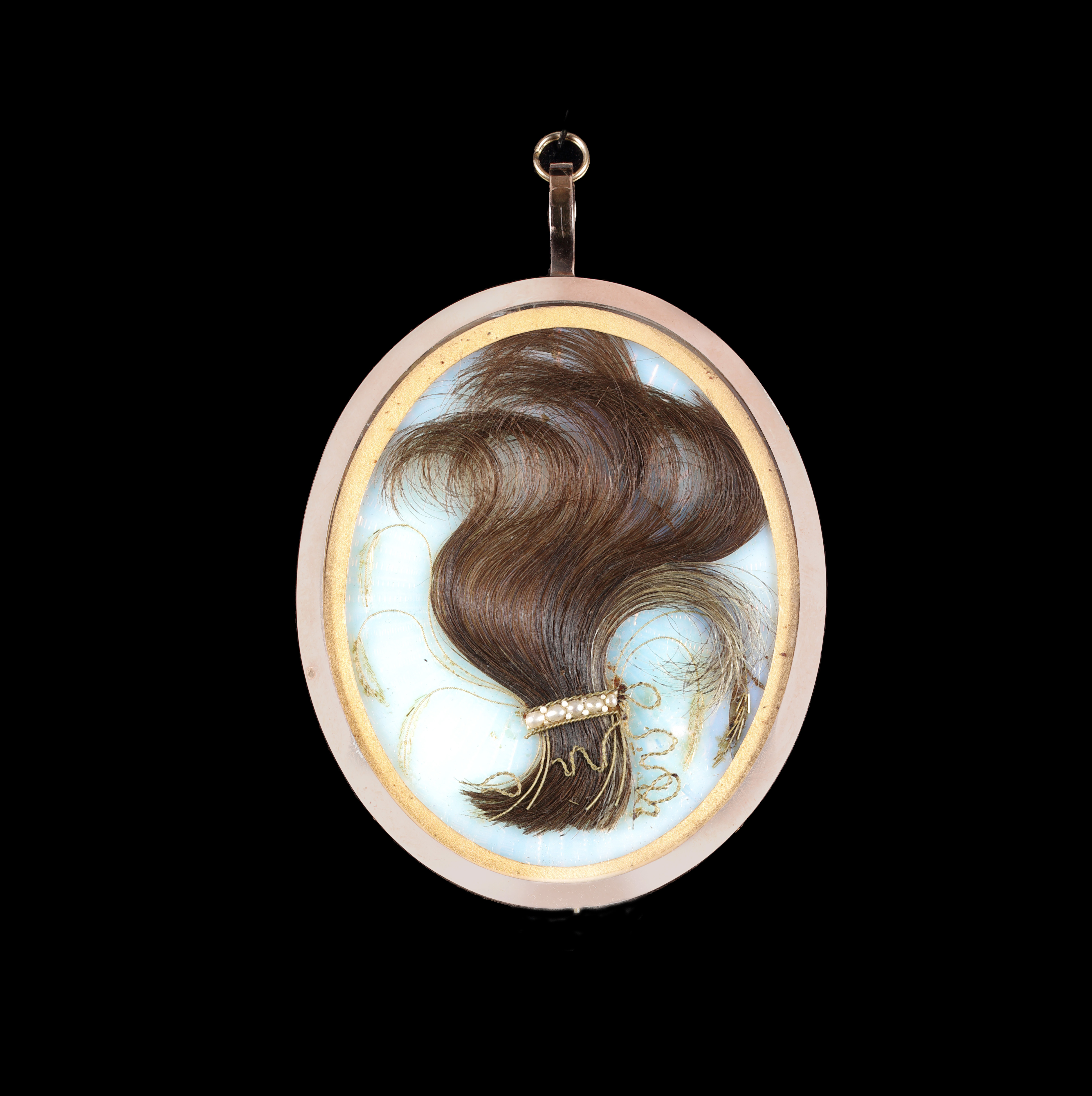 Portrait miniature of Frances Willock (1759-1806) wearing white dress with ruffled neckline and pearl bordered shoulders, her hair powdered
