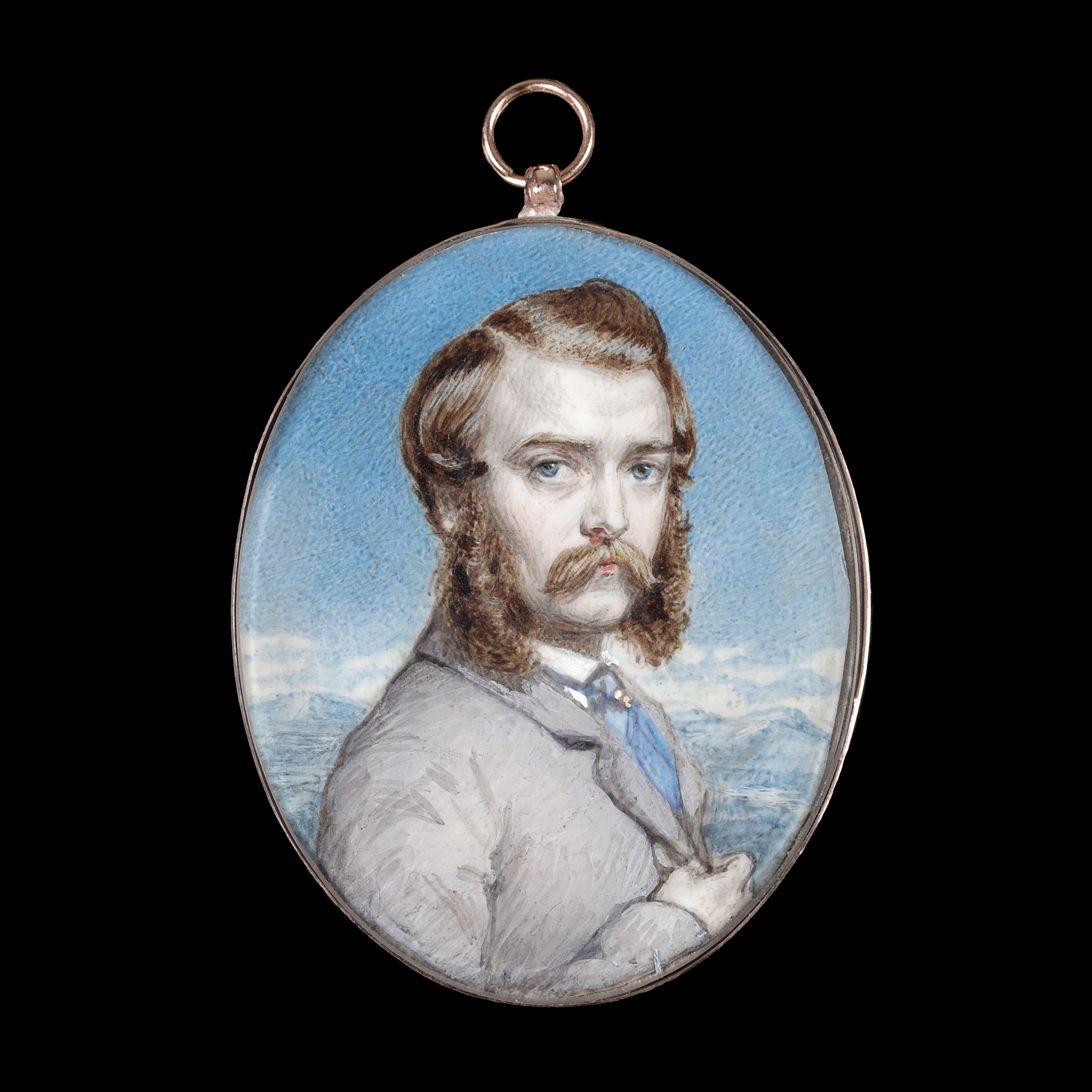 Portrait miniature of a Gentleman, possibly Heinrich Barth (1821-1865), wearing grey suit, blue tie and white shirt, standing in a mountainous landscape