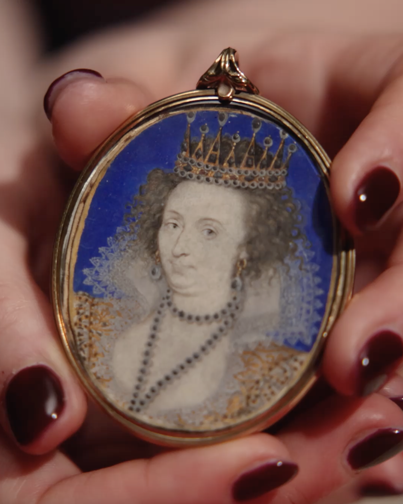 Portrait miniature of a Lady, possibly Elizabeth Grey (née Talbot), Countess of Kent (1582-1651), wearing a masque costume of a black and white dress embroidered with gold thread, ribato lace collar, large pearl earrings, pearl necklace and a crown set with pearls and diamonds