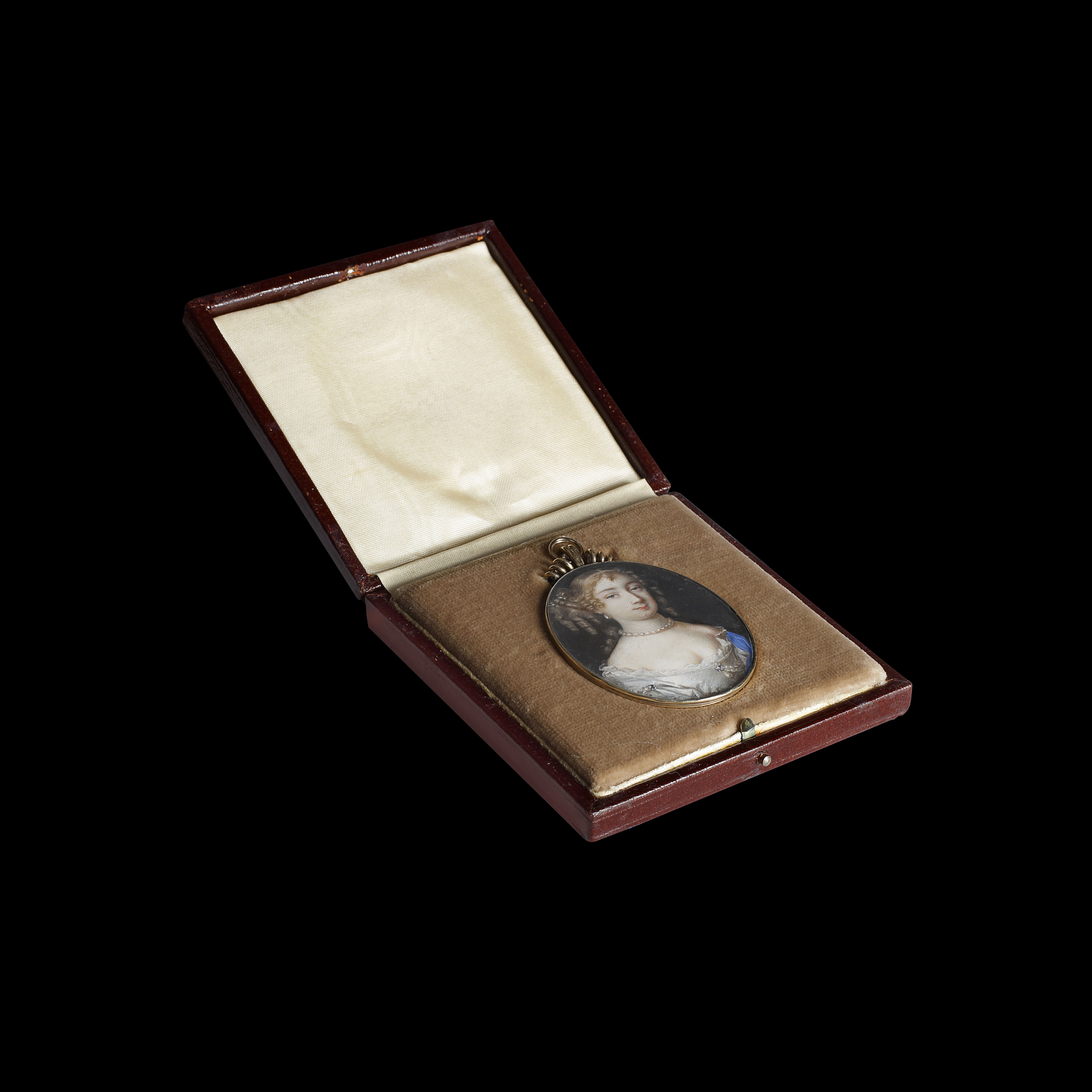 A Lady, wearing white silk dress over white lace chemise, pearl and diamond clusters at her corsage and shoulder, blue cloak, further pearls at her neck and drop earrings; circa 1675