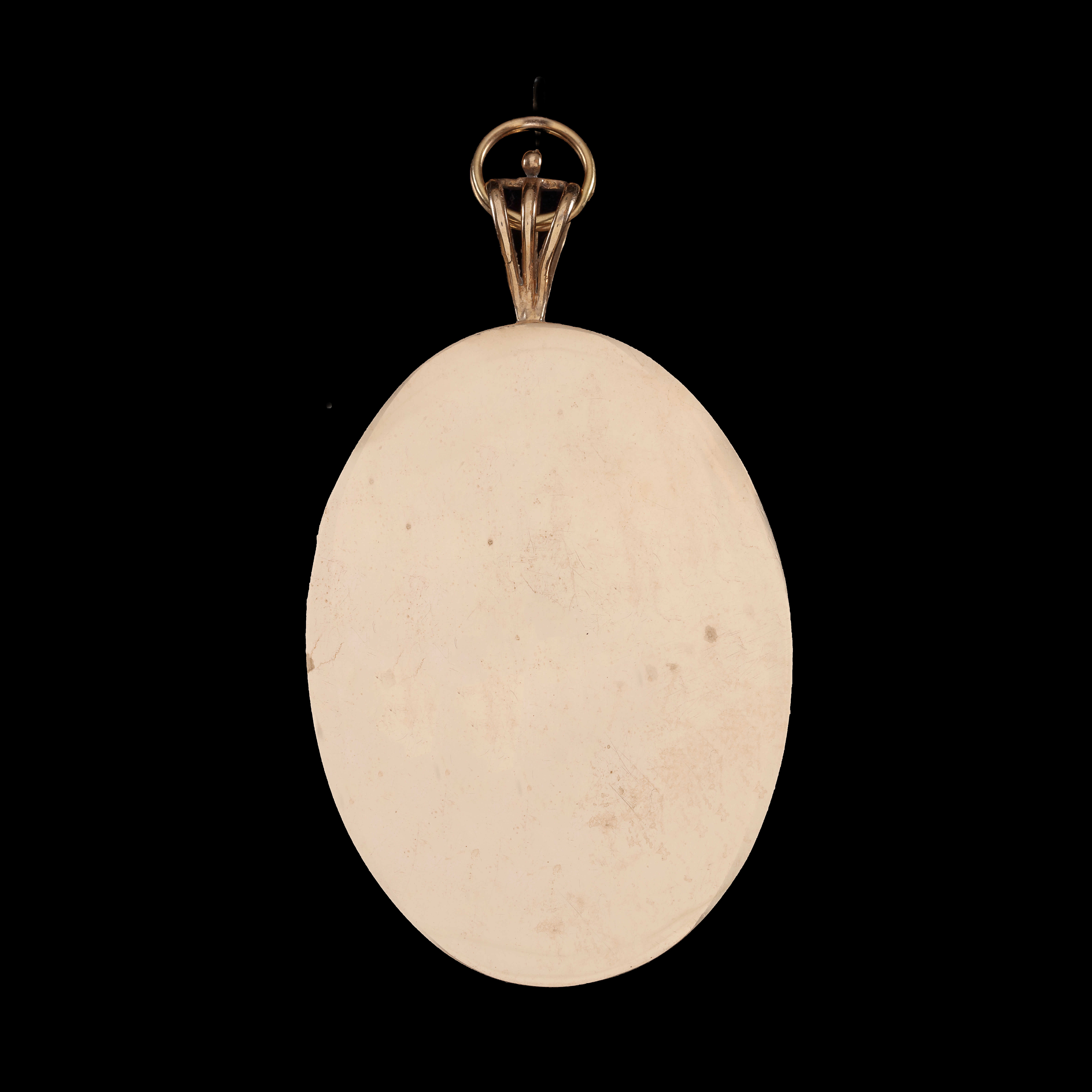 Portrait miniature of a Lady, wearing a white dress with lace-trimmed fichu, a lilac spotted kerchief in her powdered hair and tied under her chin