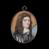 Portrait miniature of a Gentleman, in black habit slashed on front and sleeves to reveal white, white lawn collar with tassels, long brown curling hair; tan-coloured curtain and sky background, gold edge border