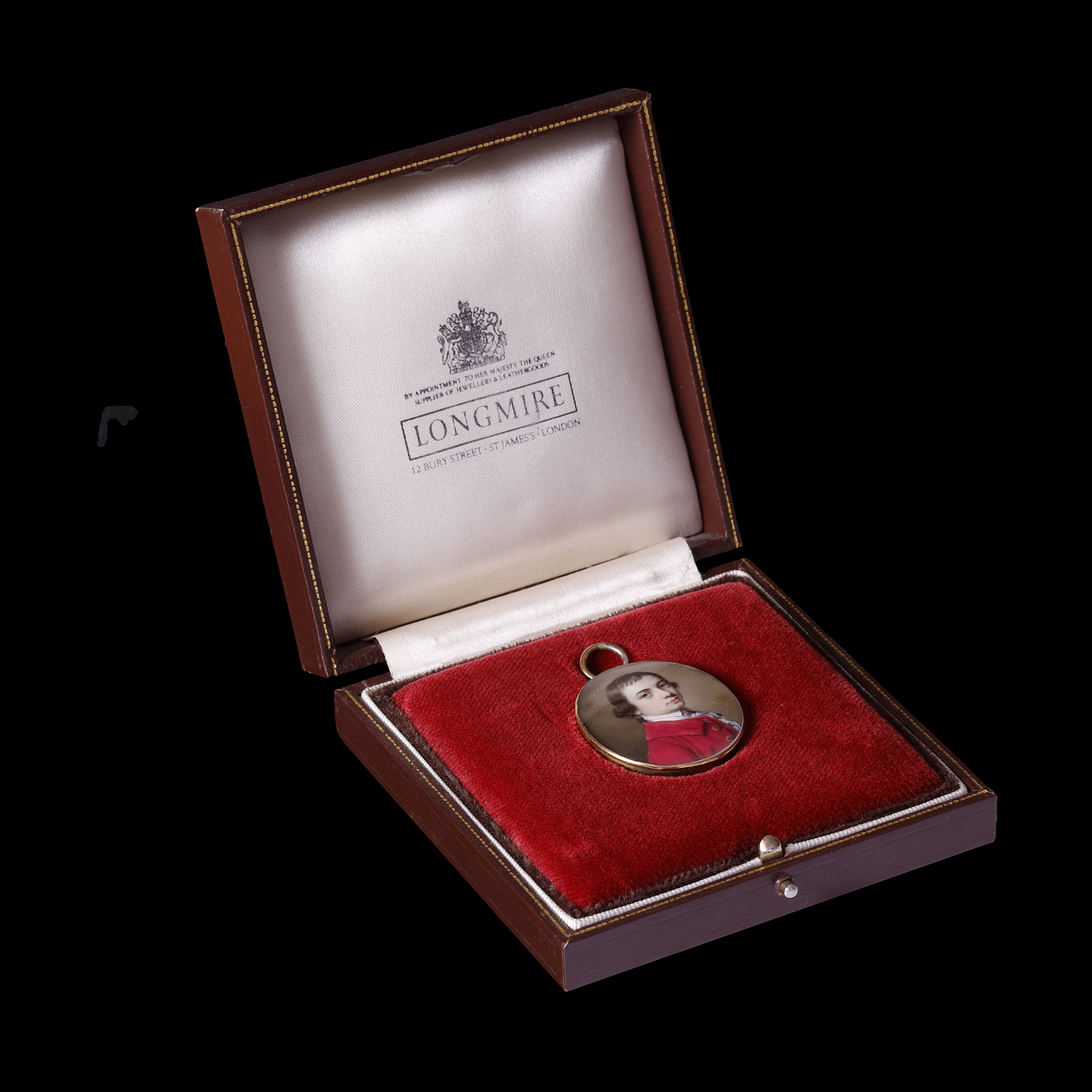 Portrait miniature of a Young Boy in crimson coat and matching waistcoat, white cravat and lace-frill shirt