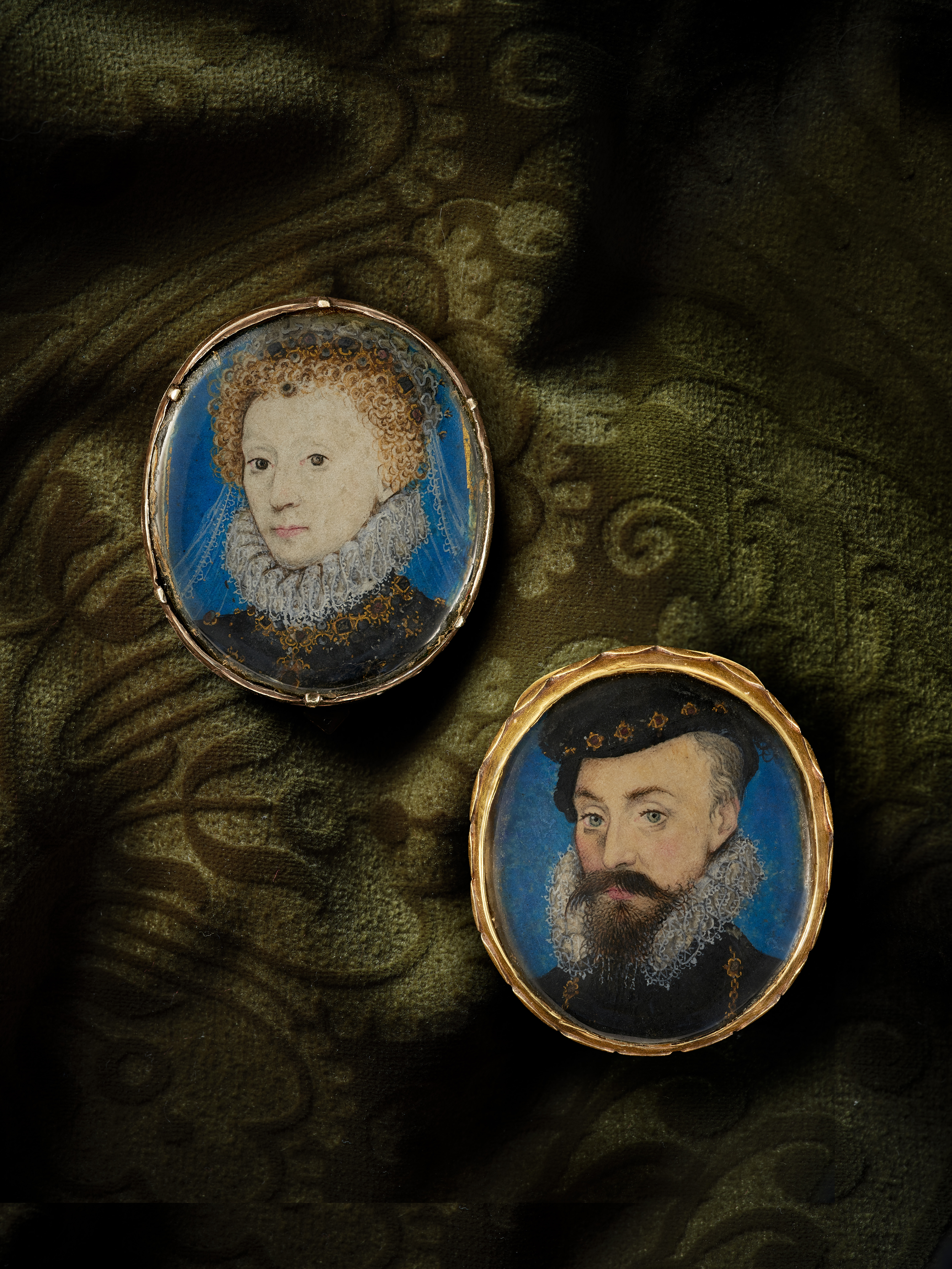 A pair of portrait miniatures of Queen Elizabeth I (1533-1603) and Robert Dudley, 1st Earl of Leicester (1532-1588); she in a black bodice, pleated ruff, and gold jewelled necklace, with a veil and jewels in her hair; he wearing a black bodice, pleated ruff, collar of the Order of the Garter, and black cap with rubies
