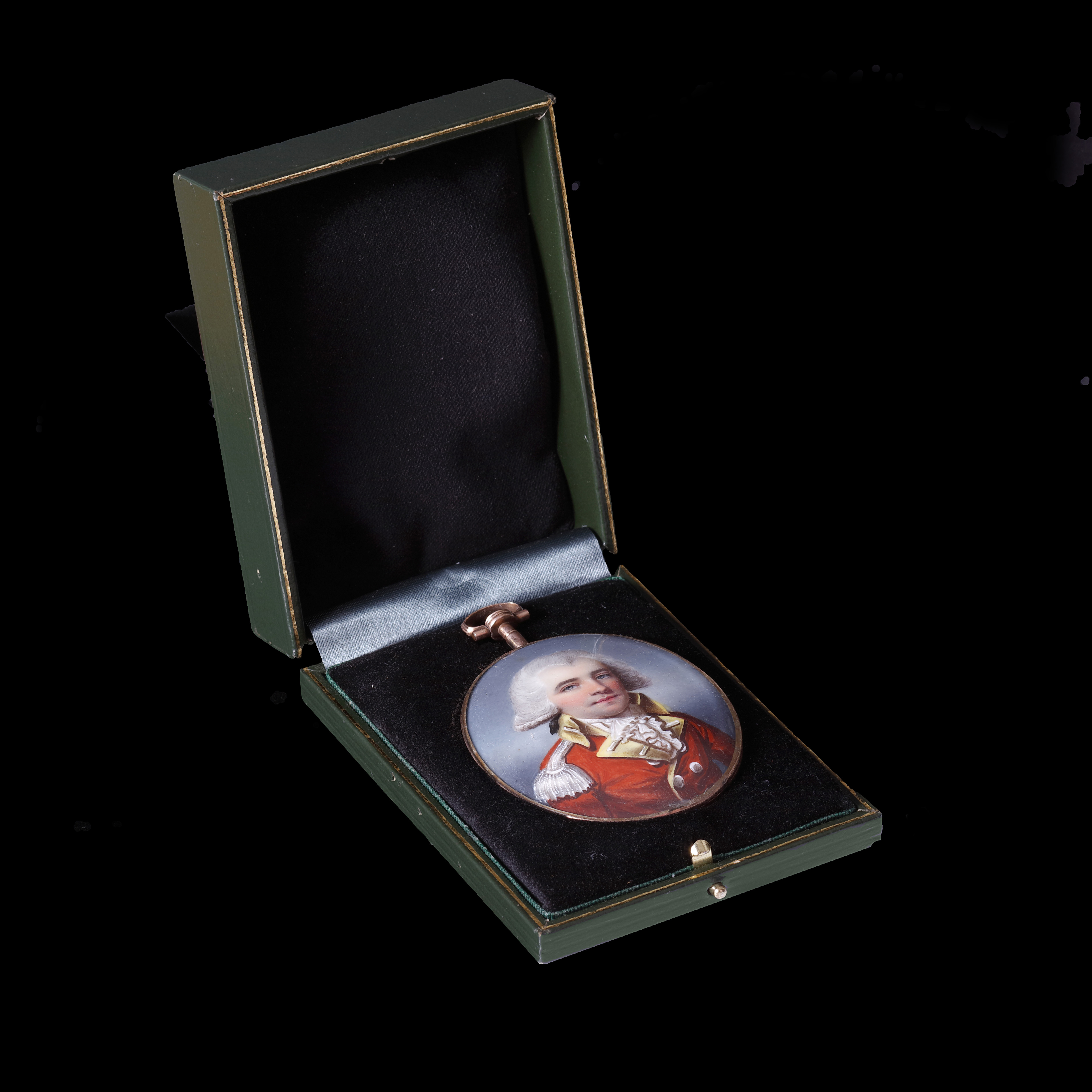 Portrait enamel of an Infantry Officer, facing right in scarlet coat with yellow facings and lapels bearing silver lace loops, frilled cravat, powdered hair en queue