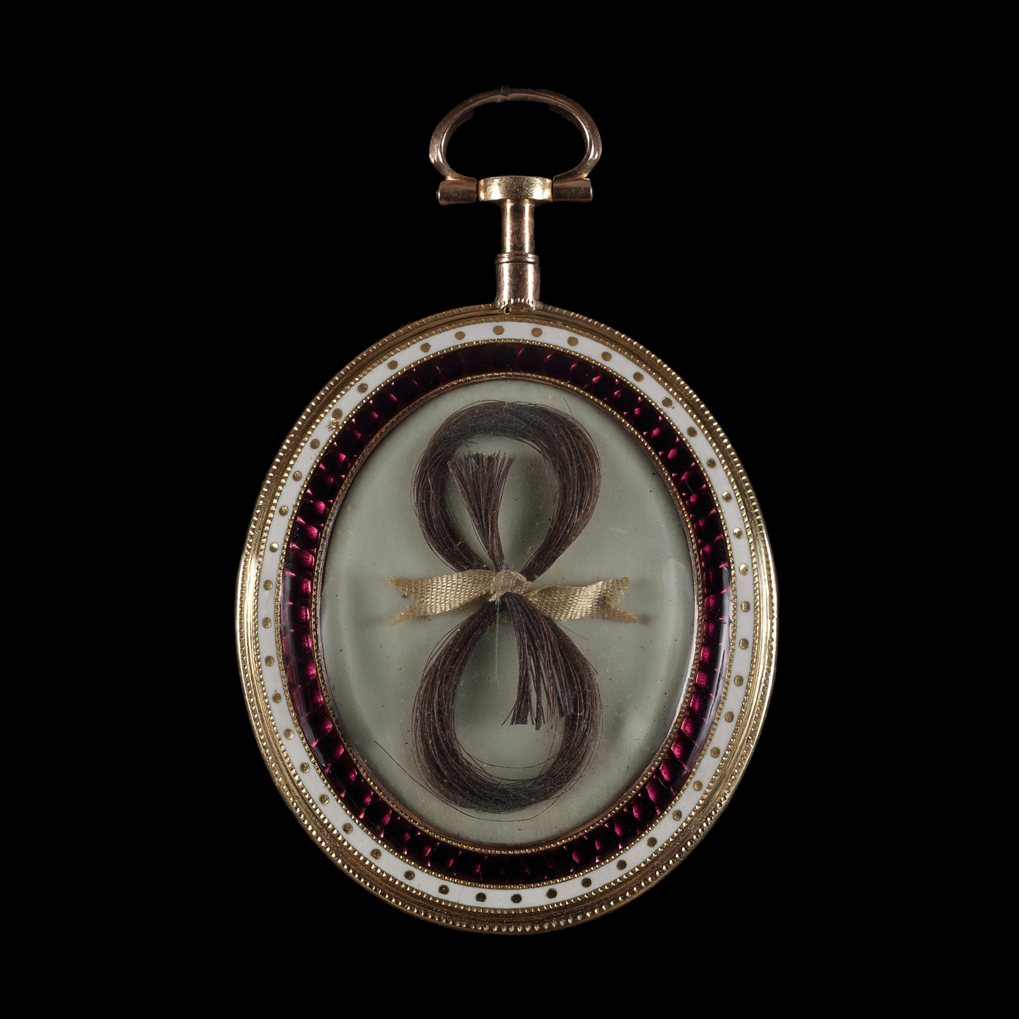 Portrait miniature of a Gentleman, wearing green jacket with yellow waistcoat and white cravat and stock
