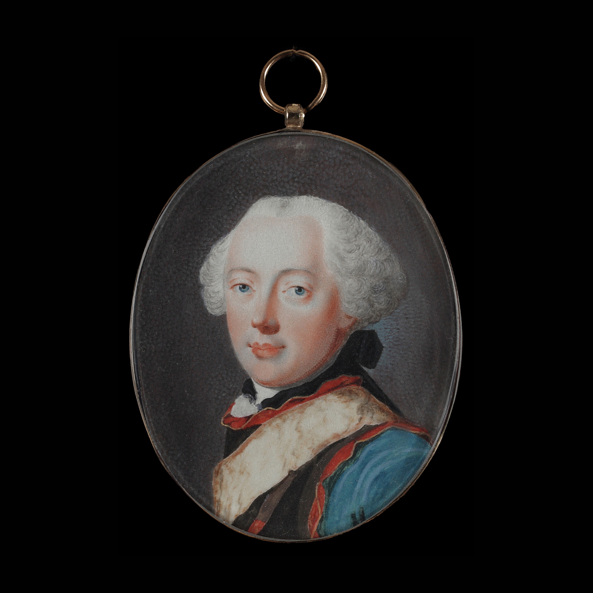 Portrait miniature, probably portraying a young Frederick the Great, wearing the sash of the Order of the Schwarzen Adler, over an armour breastplate and blue velvet jacket, black solitaire ribbon in his powdered hair;